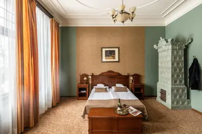 Łóżko lub łóżka w pokoju w obiekcie Villa Elise Park Pension