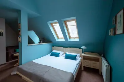 Łóżko lub łóżka w pokoju w obiekcie Villa Elise Park Pension
