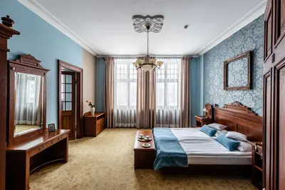 Łóżko lub łóżka w pokoju w obiekcie Villa Elise Park Pension