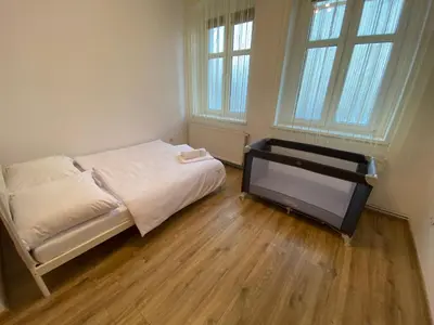 Łóżko lub łóżka w pokoju w obiekcie Apartament F21B Deluxe w Bielawie Góry Sowie