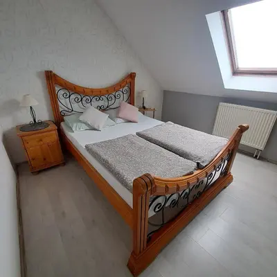 Łóżko lub łóżka w pokoju w obiekcie Noclegi Srebrna Góra