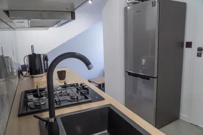 Kuchnia lub aneks kuchenny w obiekcie Apartament Główna 21
