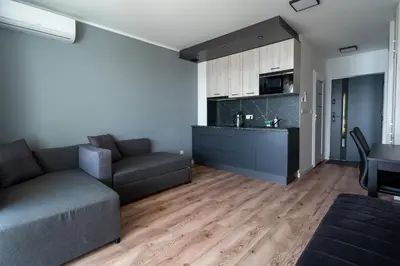 Kuchnia lub aneks kuchenny w obiekcie OW Mewa domki apartamenty nad jeziorem