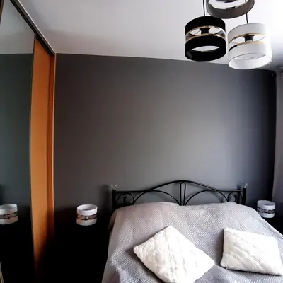 Łóżko lub łóżka w pokoju w obiekcie Apartament Grodzka