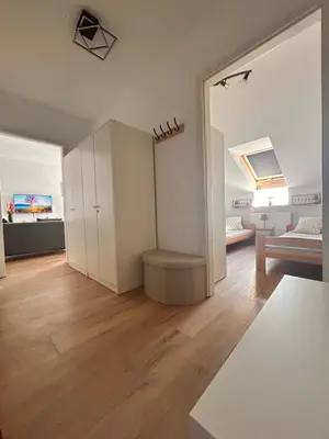 Łóżko lub łóżka w pokoju w obiekcie Apartament Słoneczny 7
