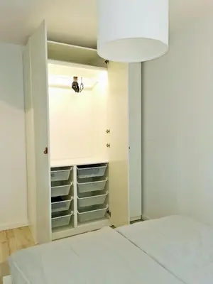 Łóżko lub łóżka w pokoju w obiekcie Nowoczesny apartament w sercu Wrocławia