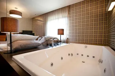 Łóżko lub łóżka w pokoju w obiekcie Hotel Wawrzyniak