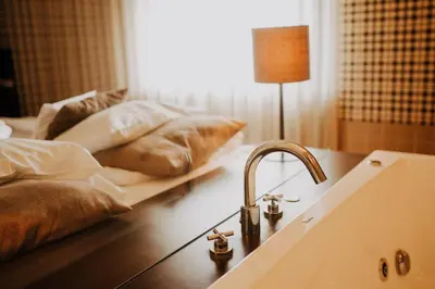 Łóżko lub łóżka w pokoju w obiekcie Hotel Wawrzyniak