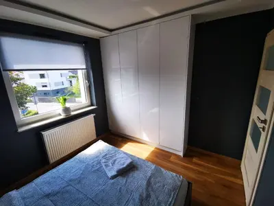 Łóżko lub łóżka w pokoju w obiekcie Apartament SIECHNICE