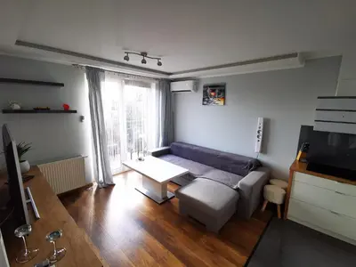 Telewizja i/lub zestaw kina domowego w obiekcie Apartament SIECHNICE