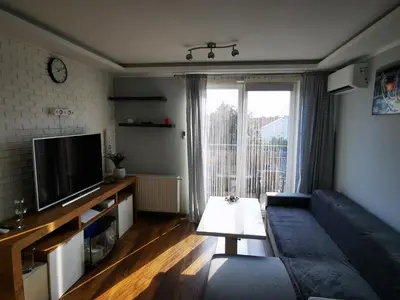 Telewizja i/lub zestaw kina domowego w obiekcie Apartament SIECHNICE