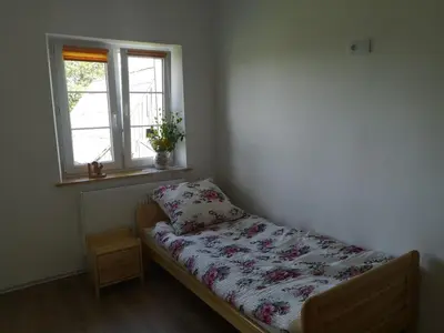 Łóżko lub łóżka w pokoju w obiekcie Agroturystyka Cieślarówka