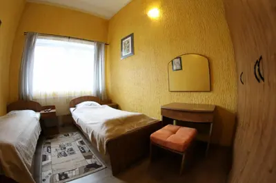 Łóżko lub łóżka w pokoju w obiekcie Gościniec Głuchołazy Zdrój