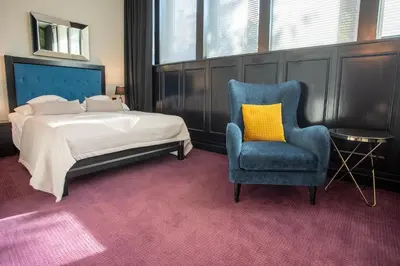 Łóżko lub łóżka w pokoju w obiekcie Hotel Szara Willa