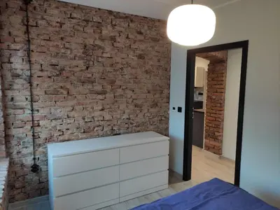 Łóżko lub łóżka w pokoju w obiekcie Apartament Loftowy Głuszyca