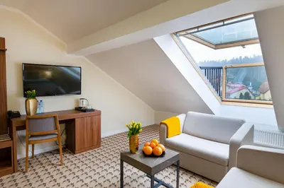Telewizja i/lub zestaw kina domowego w obiekcie Hotel Verde Montana Wellness & Spa