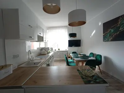 Kuchnia lub aneks kuchenny w obiekcie Szmaragdowy apartament przy ulicy Opolskiej