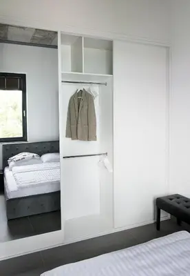 Łóżko lub łóżka w pokoju w obiekcie Apartamenty Dworcowa 60