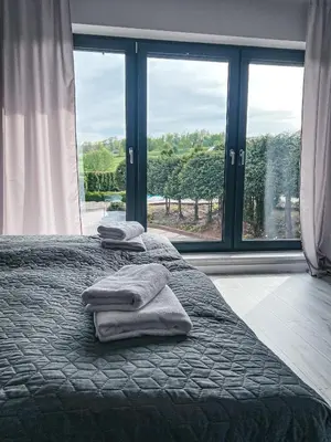 Łóżko lub łóżka w pokoju w obiekcie Agroturystyka u Maryli