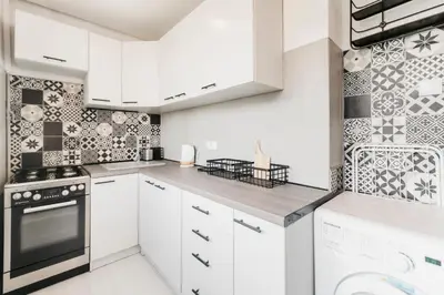 Kuchnia lub aneks kuchenny w obiekcie Nocosfera Apartament Górnośląski