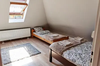 Łóżko lub łóżka w pokoju w obiekcie Apartament ZŁOTE GÓRY - Stronie Śląskie