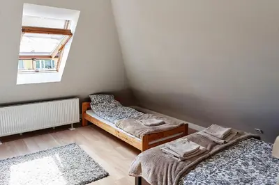 Łóżko lub łóżka w pokoju w obiekcie Apartament ZŁOTE GÓRY - Stronie Śląskie