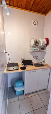 Kuchnia lub aneks kuchenny w obiekcie Pokoje Gościnne