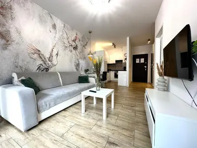 Telewizja i/lub zestaw kina domowego w obiekcie Matejki Apartment ~ Self Check-In 24 ~ Parking
