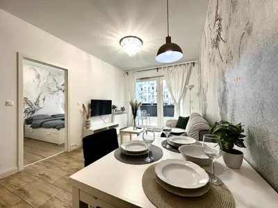 Telewizja i/lub zestaw kina domowego w obiekcie Matejki Apartment ~ Self Check-In 24 ~ Parking