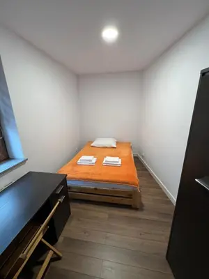 Łóżko lub łóżka w pokoju w obiekcie Apartament w centrum Świdnicy