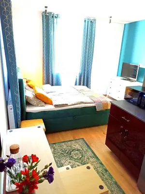 Łóżko lub łóżka w pokoju w obiekcie Apartamenty Zakładowa