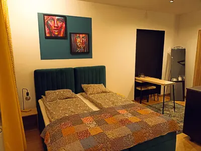 Łóżko lub łóżka w pokoju w obiekcie Apartamenty Zakładowa