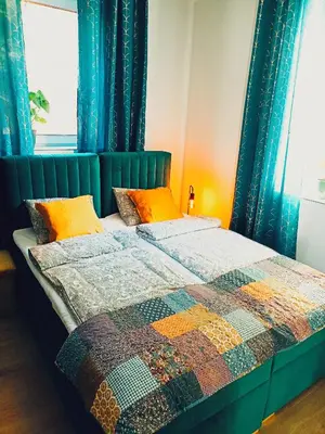 Łóżko lub łóżka w pokoju w obiekcie Apartamenty Zakładowa