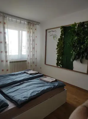 Łóżko lub łóżka w pokoju w obiekcie Apartamenty centrum