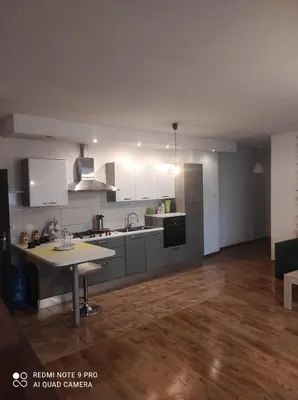 Kuchnia lub aneks kuchenny w obiekcie Apartamenty centrum