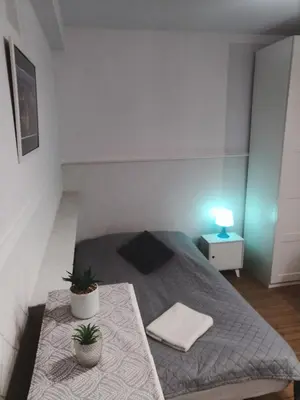 Łóżko lub łóżka w pokoju w obiekcie Studio LUX Gaj by Apartamenty na dni Wrocław