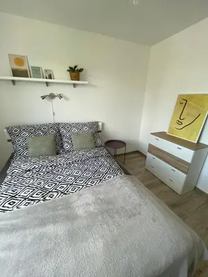Łóżko lub łóżka w pokoju w obiekcie Apartament Wałbrzych