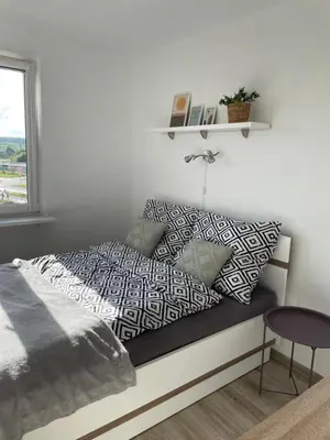 Łóżko lub łóżka w pokoju w obiekcie Apartament Wałbrzych