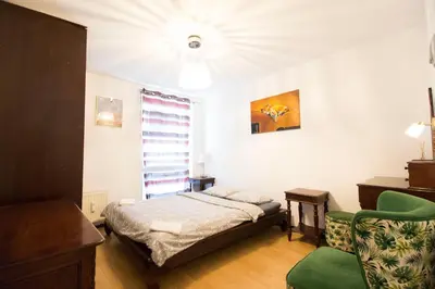 Łóżko lub łóżka w pokoju w obiekcie Happy Apartments Old Town