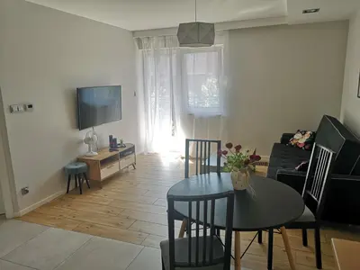 Telewizja i/lub zestaw kina domowego w obiekcie Apartament Marzenie 8 - Opole