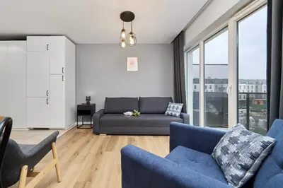 Część wypoczynkowa w obiekcie Jagodno Wrocław Kajdasza Studio z Bezpłatnym Garażem by Noclegi Renters