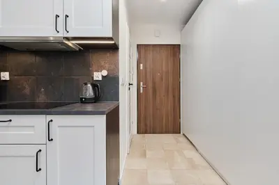 Kuchnia lub aneks kuchenny w obiekcie Jagodno Wrocław Kajdasza Studio z Bezpłatnym Garażem by Noclegi Renters