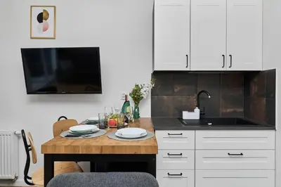 Kuchnia lub aneks kuchenny w obiekcie Jagodno Wrocław Kajdasza Studio z Bezpłatnym Garażem by Noclegi Renters