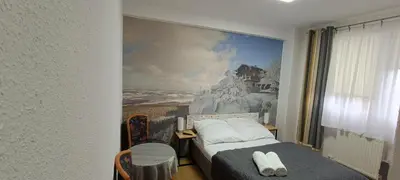 Łóżko lub łóżka w pokoju w obiekcie Jaśminowe Wzgórze