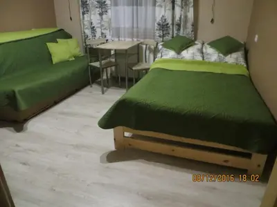 Łóżko lub łóżka w pokoju w obiekcie Noclegi U Andrzeja