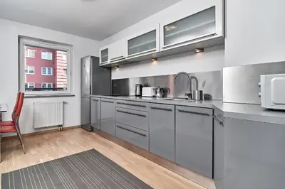 Kuchnia lub aneks kuchenny w obiekcie Apartament Spiżowa z Balkonem Wrocław by Noclegi Renters