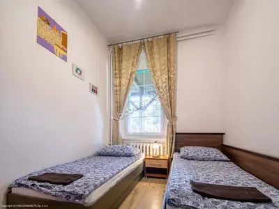 Łóżko lub łóżka w pokoju w obiekcie Willa Dunajec