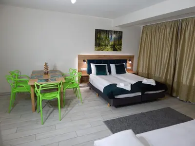 Łóżko lub łóżka w pokoju w obiekcie AGAT Apartament Czarna Góra