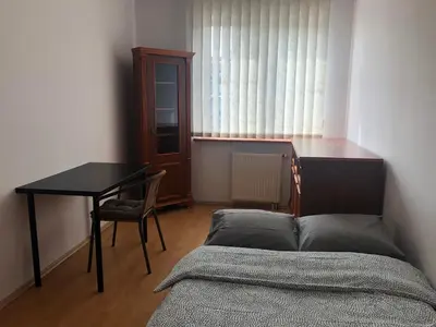 Łóżko lub łóżka w pokoju w obiekcie Blue River - Daszynskiego