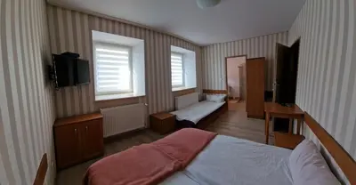 Łóżko lub łóżka w pokoju w obiekcie Noclegi Ali